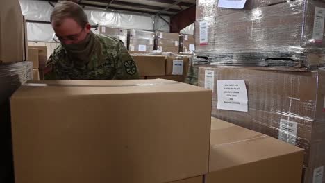 Arizona-National-Guard-Service-Members-Prepare-Pallets-Of-Medical-Protective-Equipment-For-Shipment