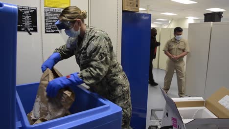 Personnel-Assigned-To-The-Naval-Medical-Center-San-Diego-Distribute-Their-First-Covid-19-Vaccine-Doses