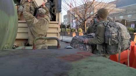 National-Guard-Members-In-Process-At-The-Washington-Dc-Armory,-Prior-To-Helping-Secure-Presidential-Inauguration