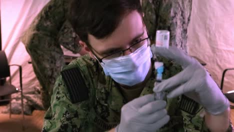 3Rd-Marine-Division-Marines-And-Sailors-Are-Innoculated-With-The-Covid-19-Antibody-Vaccine-In-Okinawa,-Japan