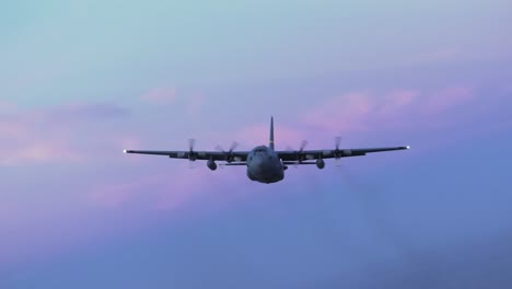 C-130-Hercules,-153Rd-Airlift-Wing,-Wyoming-National-Guard-Flys-At-Dusk,-Releasing-Flares-On-Training-Mission