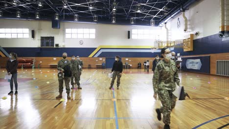 Soldiers-Register,-Line-Up-And-Recieve-Shots-With-A-Needle-And-Syringe-Of-Covid-19-Pandemic-Vaccines