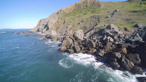 Aerial-Drone-View-Of-The-American-Challenger,-A-Vessel-That-Ran-Aground-On-The-Rocky-Shore-Near-Dillon-Beach,-Ca