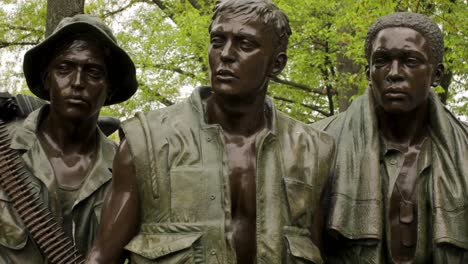 Camera-And-Motion-Control-Clips-Of-The-Names-On-The-Wall-And-Statues-Of-Soldiers-At-The-Vietnam-War-Memorial,-Dc