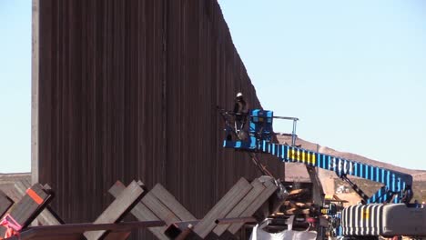 Construction-Workers-And-Heavy-Equipment,-Border-Wall-El-Paso-1-Project-Span-Near-Deming,-New-Mexico