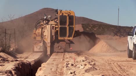 Construction-Workers,-Heavy-Equipment,-Dig-Trenches,-Border-Wall-At-El-Paso-1-Project-Span-Near-Deming,-Nm