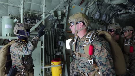 Us-Military-High-Altitude-Low-Opening-Sky-Diving-Training-Exercise-Over-The-Blue-Waters-Of-The-Pacific-Ocean