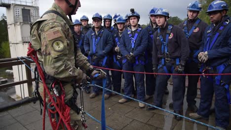 Us-Air-Force-Airmen-Teach-Firemen-And-First-Responders-How-To-Rescue-A-Suspended-Victim,-Ramestein-Air-Base