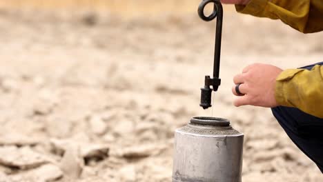 Camp-Pendleton-Fire-Department-Prepares-A-Kerosene-Cannister-Before-A-Prescribed-Burn-To-Reduce-Risk-Of-A-Large-Grassland-Wildfire,-California