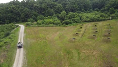 Aerial-Drone-Footage-Of-Humvees-25Th-Transportation-Battalion-Soldiers-Practice-Shooting-Targets,-Convoy-Live-Machine-Gun-Fire-Training-Exercise,-Korea