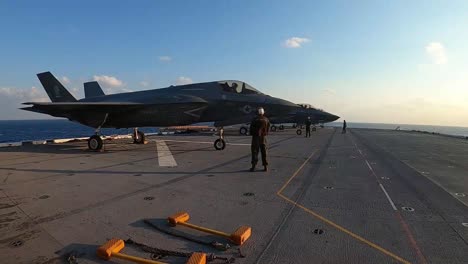 Sailors-On-The-Forward-Deployed-Amphibious-Assault-Ship-Uss-America-Conduct-Flight-Operations-In-The-Philippine-Sea