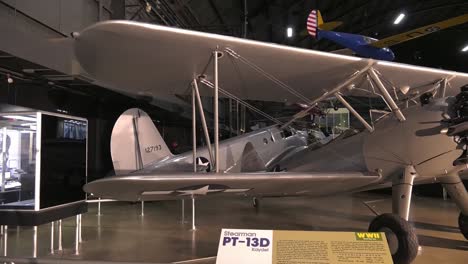 Drone-Shot,-Of-Stearman-Pt-13D-And-Display-Honoring-African-American-Tuskegee-Airmen-Wright-Patterson-Afb-Museum