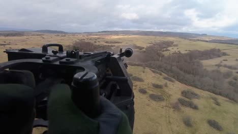 Us-Army-Soldiers-Military-Live-Fire-Aerial-Machine-Gunnery-Training-From-Helicopters-Flying-Over-Baumholder,-Germany