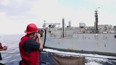 Amphibious-Transport-Ship-Uss-Arlington-Conducts-Replenishment-At-Sea-Op-With-Lewis-And-Clark-Class-Dry-Cargo-Ammunition-Ship-Usns-Medgar-Evers