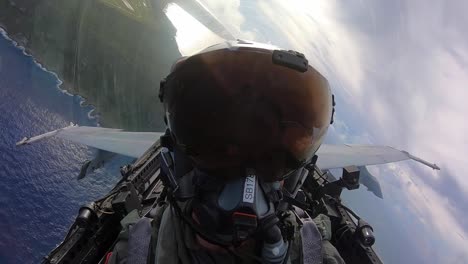 Cockpit-Footage-And-Ground-Crew-Loading-Munitions-Onto-Fighter-Jet,-Marine-Corp-Flight-Ops-Andersen-Air-Force-Base,-Guam