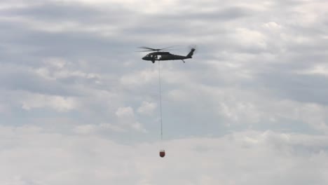 Wisconsin-Army-National-Guard-Uh-60-Black-Hawk-Helicopter-Crews-Train-Filling-Bambi-Buckets-To-Drop-Water-And-Fight-Wildfires