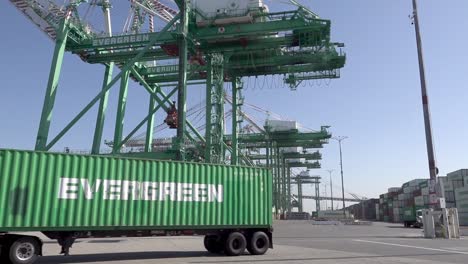 Long-Beach-Sea-Port-Shipping-And-Container-Operations-During-Supply-Chain-Crisis,-Including-Ships,-Trucks,-Cranes,-Ca