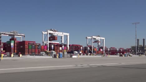 Long-Beach-Sea-Port-Shipping-And-Container-Operations-During-Supply-Chain-Crisis,-Including-Ships,-Trucks,-Cranes,-Ca