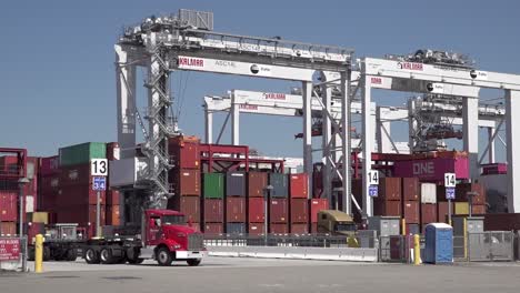 Long-Beach-Sea-Port-Shipping-And-Container-Operations-During-Supply-Chain-Crisis,-Including-Ships,-Trucks,-Cranes,-Ca