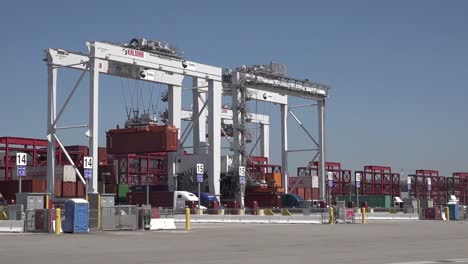 Long-Beach-Sea-Port-Shipping-And-Container-Operations-During-Supply-Chain-Crisis,-Including-Ships,-Trucks,-Cranes,-Ca