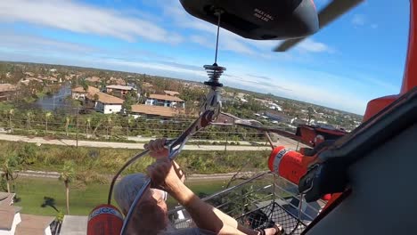 Us-Coast-Guard-Mh-65-Dolphin-Aircrew-Helicopter-Search-And-Rescue-Evacuation-Flight-After-Hurricane-Ian,-Sanibel-Florida