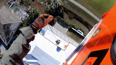 Us-Coast-Guard-Aircrew-Helicopter-Over-Storm-Damaged-Island-Neighborhoods-Hurricane-Ian-Near-Fort-Myers-Beach,-Fl