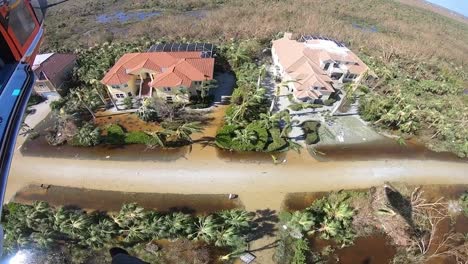 Us-Coast-Guard-Mh-65-Dolphin-Aircrew-Rescue-Operation-Near-Sanibel,-Florida-In-The-Storm-Wake-Of-Hurricane-Ian