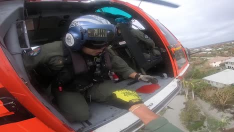 Us-Coast-Guard-Mh-65-Dolphin-Aircrew-Rescue-Operation-Near-Sanibel,-Florida-In-The-Storm-Wake-Of-Hurricane-Ian