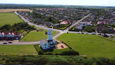 Aerial-view-of-Hunstanton-lighthouse,-cliffs-and-beach