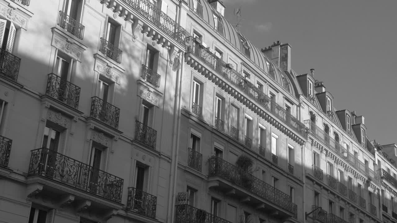 Premium stock video - Black and white view of most famous haussmann of  architectural building in 5th district in paris, france at daytime