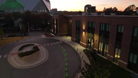 Low-aerial-of-urban-American-city-school-at-night