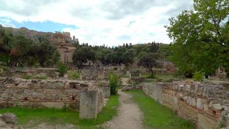 Ruins-of-Ancient-Agora-of-Athens-with-Acropolis-in-Background