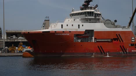 A-shot-of-an-anchor-handling-vessel,-concretly-the-Pacific-Dispatch,-anchored-in-the-Dakar-port