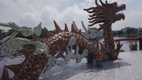 La-Pagoda-Phu-Chau-O-El-Templo-Flotante-Es-Un-Antiguo-Lugar-De-Culto-Budista-De-Estilo-Chino-En-Medio-Del-Río-Phuam-Thuat-En-El-Distrito-Go-Vap-De-La-Ciudad-De-Ho-Chi-Minh,-Vietnam