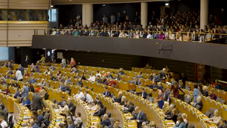 Politicians-leaving-the-European-Parliament-hemicycle-after-session-in-the-plenary-chamber---Brussels,-Belgium