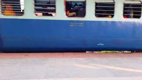 indian-passenger-express-train-leaving-station-on-track-at-evening-from-flat-angle-video-is-taken-at-kamakhya-railway-station-assam-india-on-May-22-2022