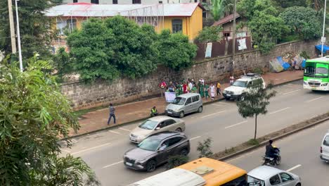 Group-Ethiopian-walking-in-the-street-with-sign