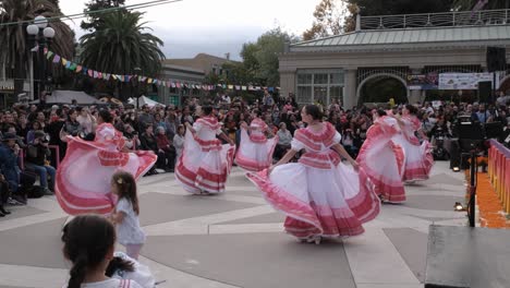 Group-of-folklorico-dancers-performing-at-dia-de-los-muertos-festival-in-Redwood-City,-CA