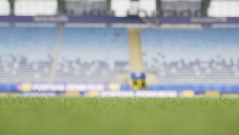 Football-pitch-and-empty-stands-before-football-match-in-Poland