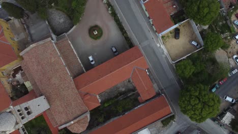 Drone-shot-of-the-Amphitheater-in-Pula,-Croatia---drone-is-flying-over-the-site-in-birds-eye-view