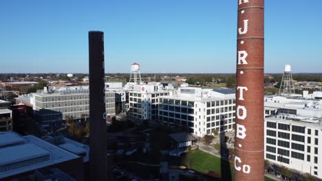 Aerial-forward-shot-of-RJR-Tobacco-towers-in-downtown-Winston-Salem,-NC