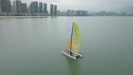 Instructor-catamaran-supervising-sailing-club-lesson-in-the-bay