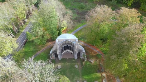 Cinematic-drone-shot-of-a-middle-ages-Monastery-ruin-called-Heisterbach-Abbey-in-Siebengebirge,-Germany-during-autumn