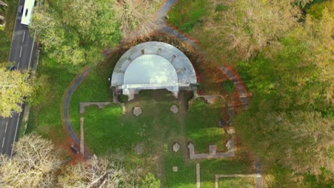 Bird's-eye-view-of-a-middle-ages-Monastery-ruin-called-Heisterbach-Abbey-in-Siebengebirge,-Germany-during-autumn