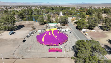 Ventura-traveling-circus-in-California-City---orbiting-aerial-view-reveals-the-location-in-the-Mojave-Desert-and-mountain-range