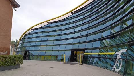 Entrance-to-Ferrari-Modena-Museum-celebrating-75-years-of-a-company-with-tourists-visiting-it