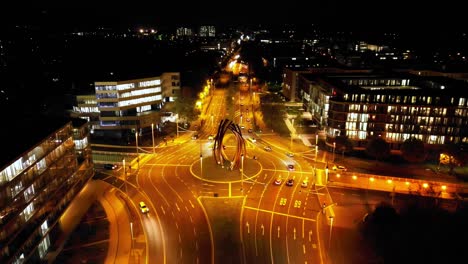 Nächtliche-Vorschubluftaufnahme-Des-Kunstwerks-Helmut-schmidt-platz-Auf-Der-B9-In-Bonn,-Deutschland