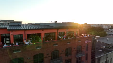 People-enjoy-eating-drinking-at-outdoor-bar-and-restaurant