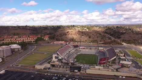 The-new-Snapdragon-football-stadium-in-Mission-Valley,-wide-drone-orbit