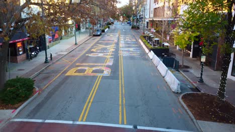 Black-Lives-Matter-painting-in-streets-oof-Greensboro,-NC-during-fall